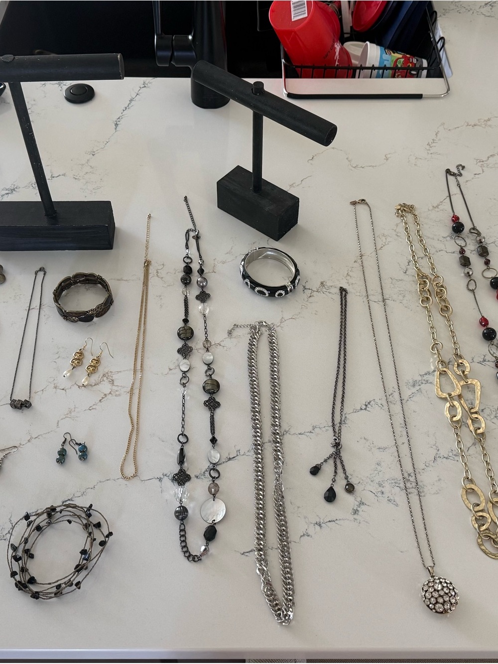 Assorted Jewelry Lot-Necklaces Bracelets Earrings and two wooden display pieces.